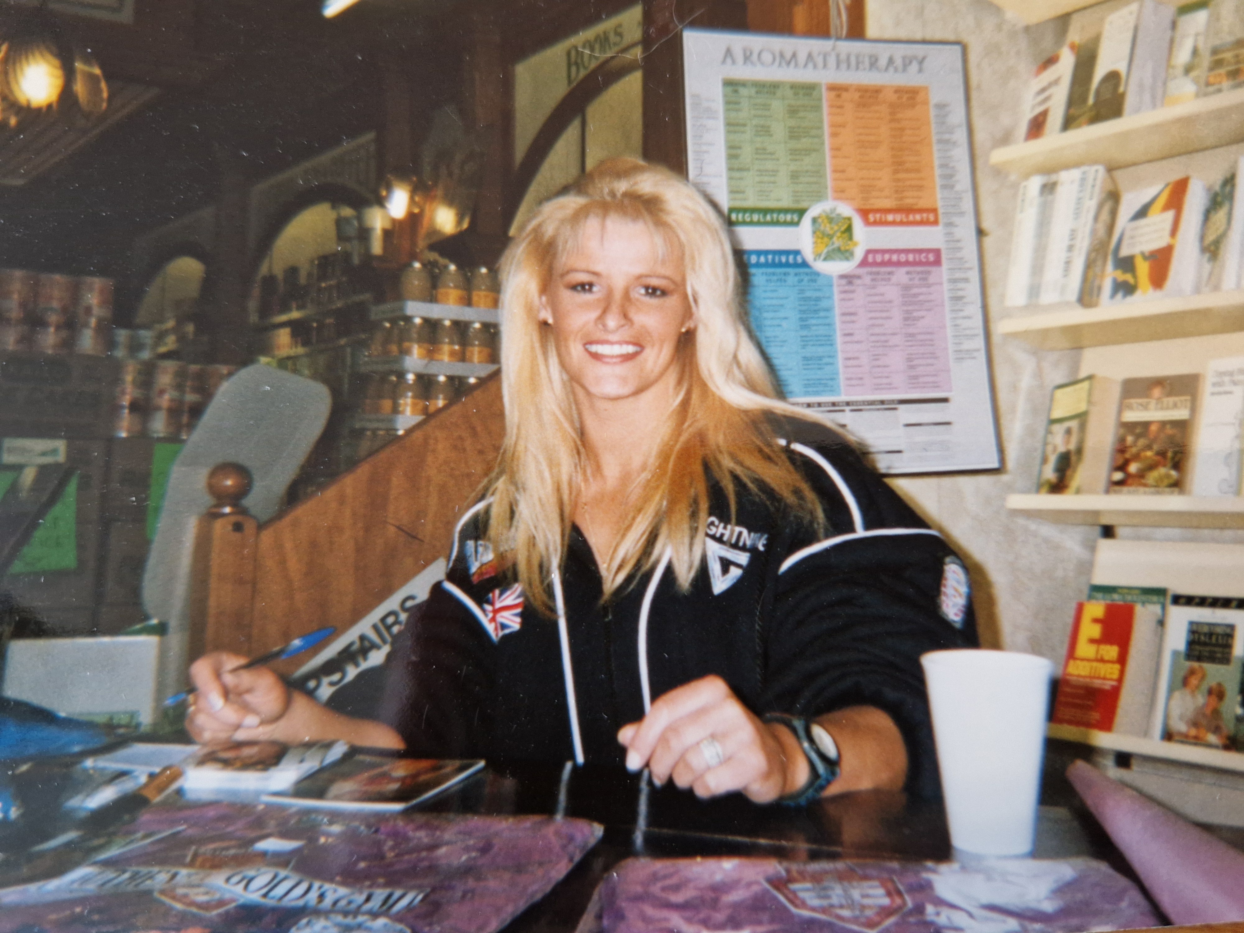 Lightning from Gladiators, Kim Betts signing autographs in Cardiff.